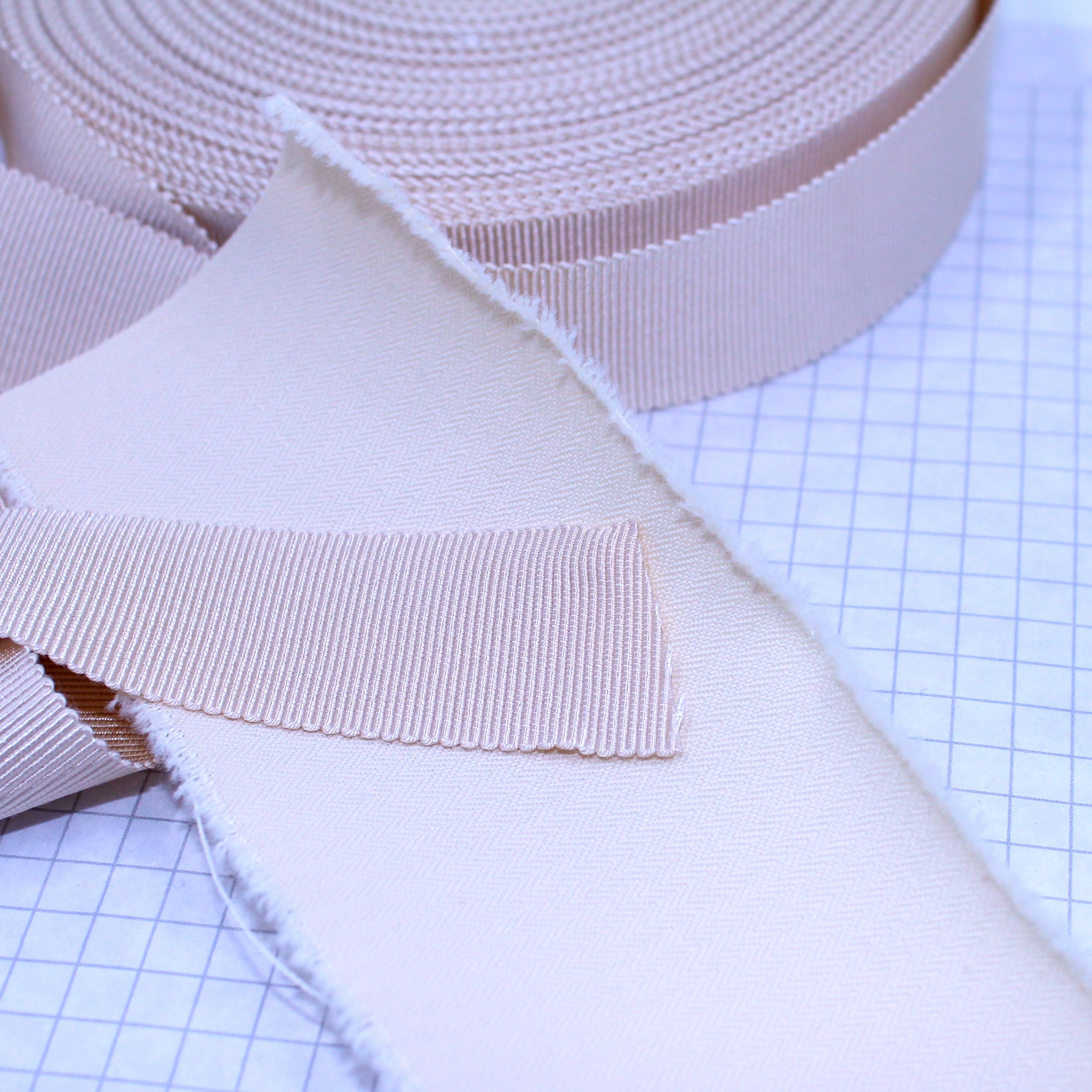 Beige Petersham ribbon, 24mm wide with champaign coutil. Co-ordintates nicely
