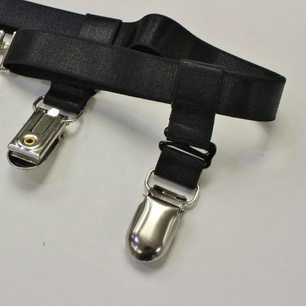 Garter suspender grips on thigh garter