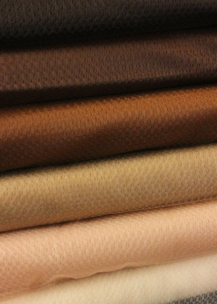 6 bolts of 6 shades of soufle fabric stacked up